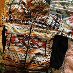 Black brand AZTEC windbreaker never worn.